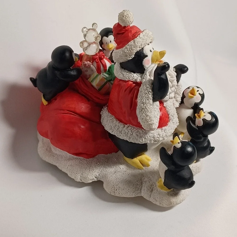 House of Lloyd Penguin Santa Figurine Music Box Plays Let it Snow  Works Great!!